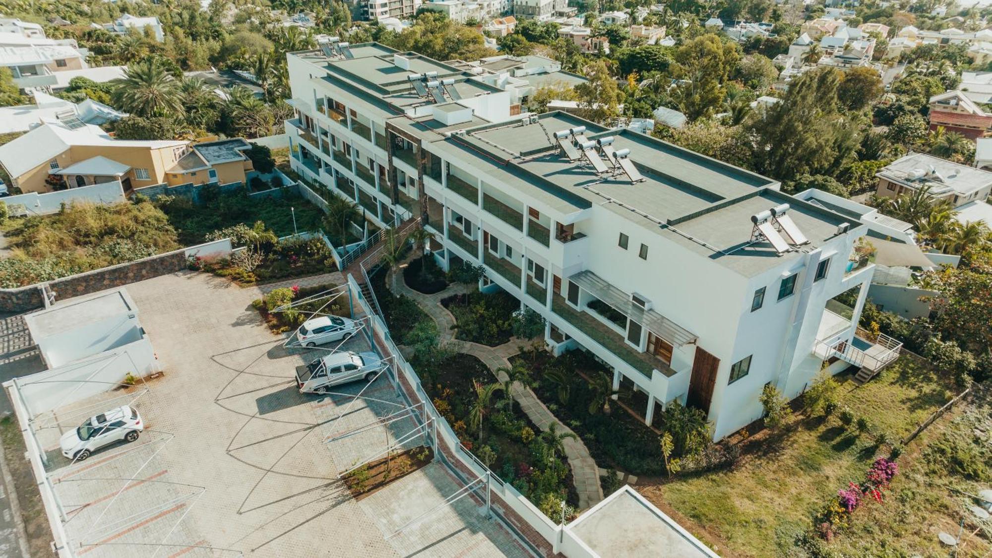 Appartement De Luxe Piscine Et Vue Mer Riviere Noire Exterior photo